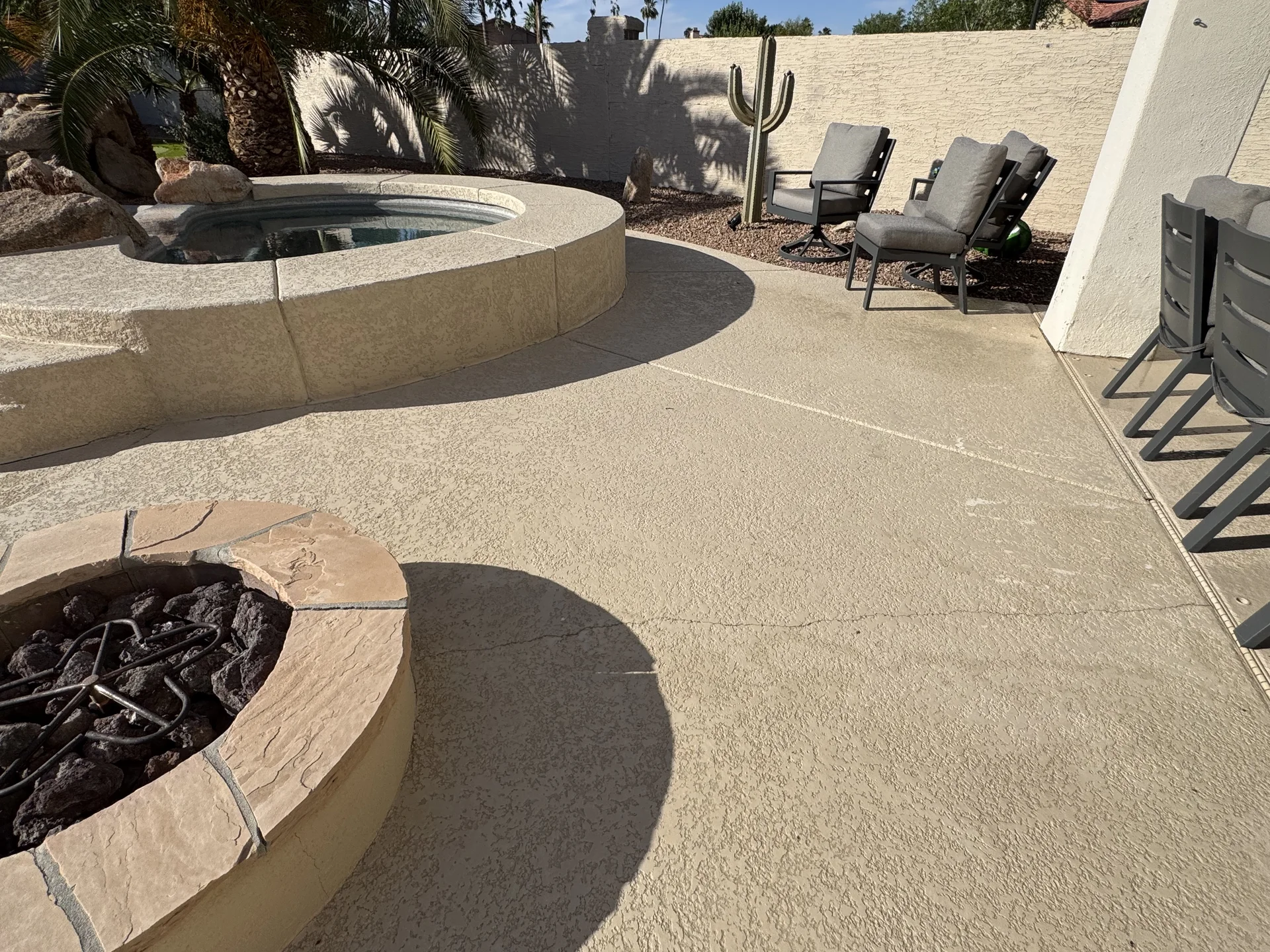 Commercial pressure washing mist over driveway