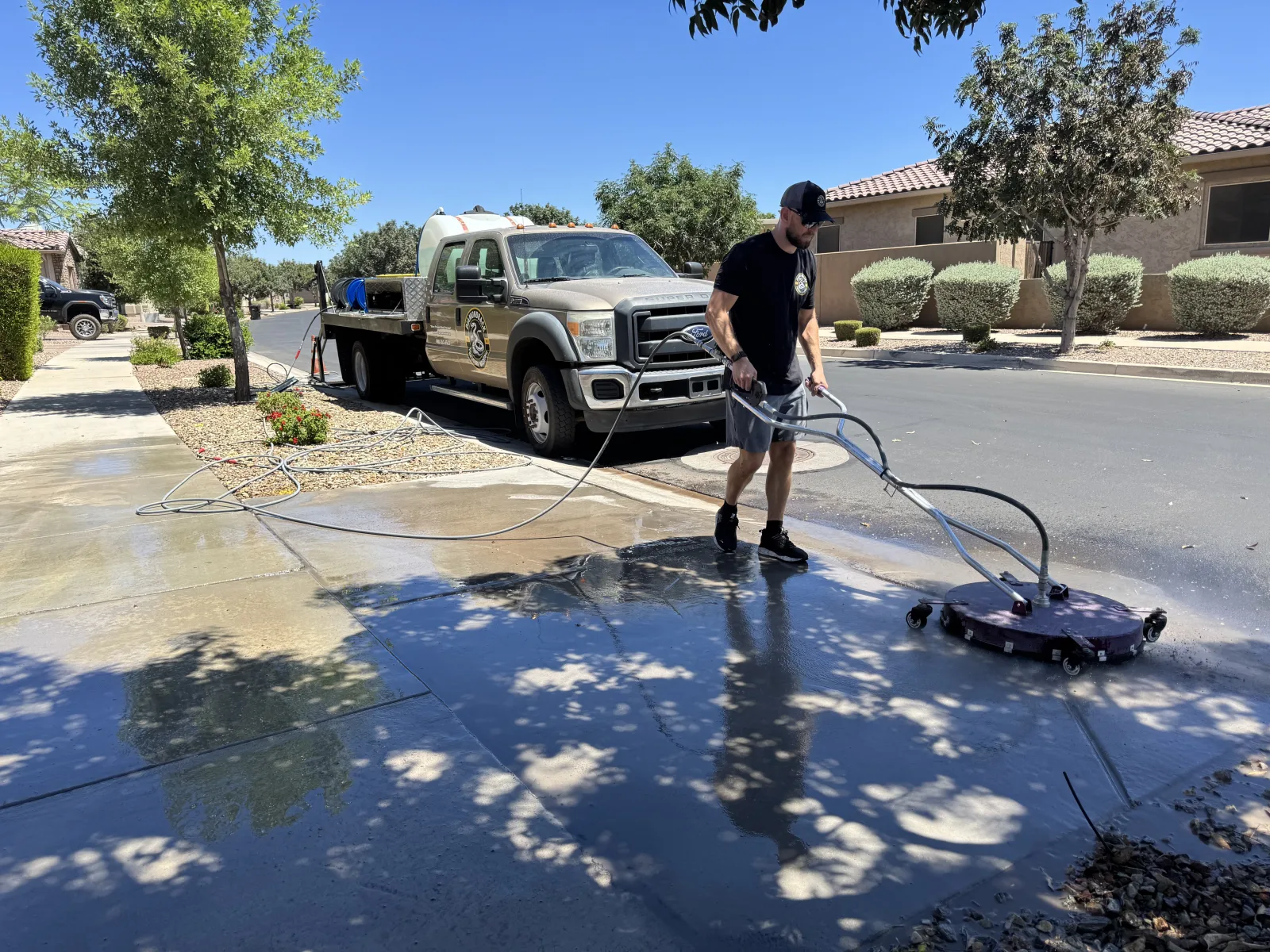 Diamondback service truck on site for a scheduled driveway cleaning visit