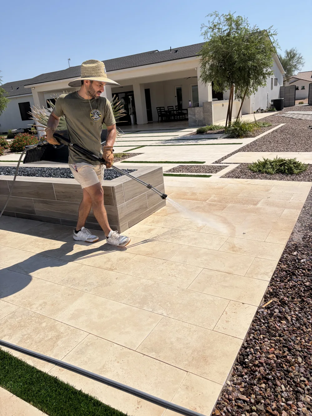 Cleaning travertine walkway joints before joint sand restoration